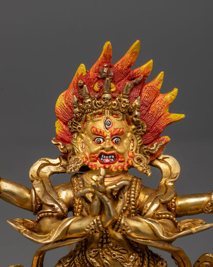Close-up of Four Armed Vajrapani’s fierce face with radiant halo and detailed gold gilding