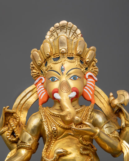 Close-up of Ganesha’s gold-gilded face and 24K fire-gilded body with fine detailing