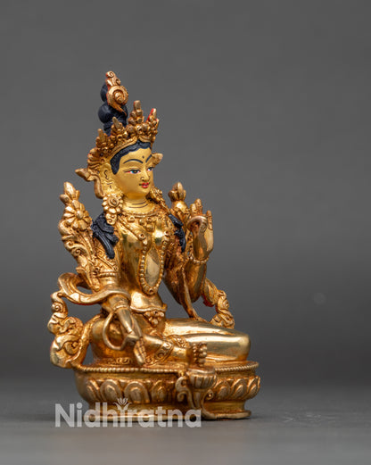 Close-up of Green Tara Bodhisattva sculpture showing intricate Newari artisan details