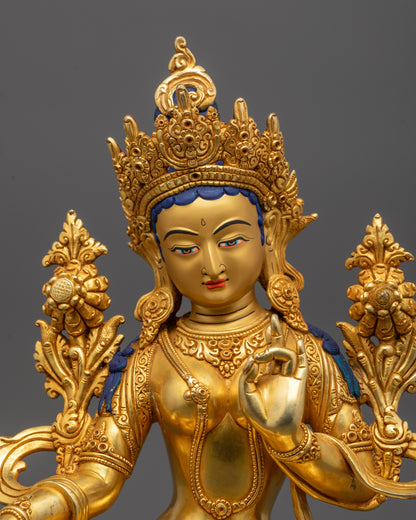 Close-up of Green Tara Statue face polished with pure 24k gold showing serene