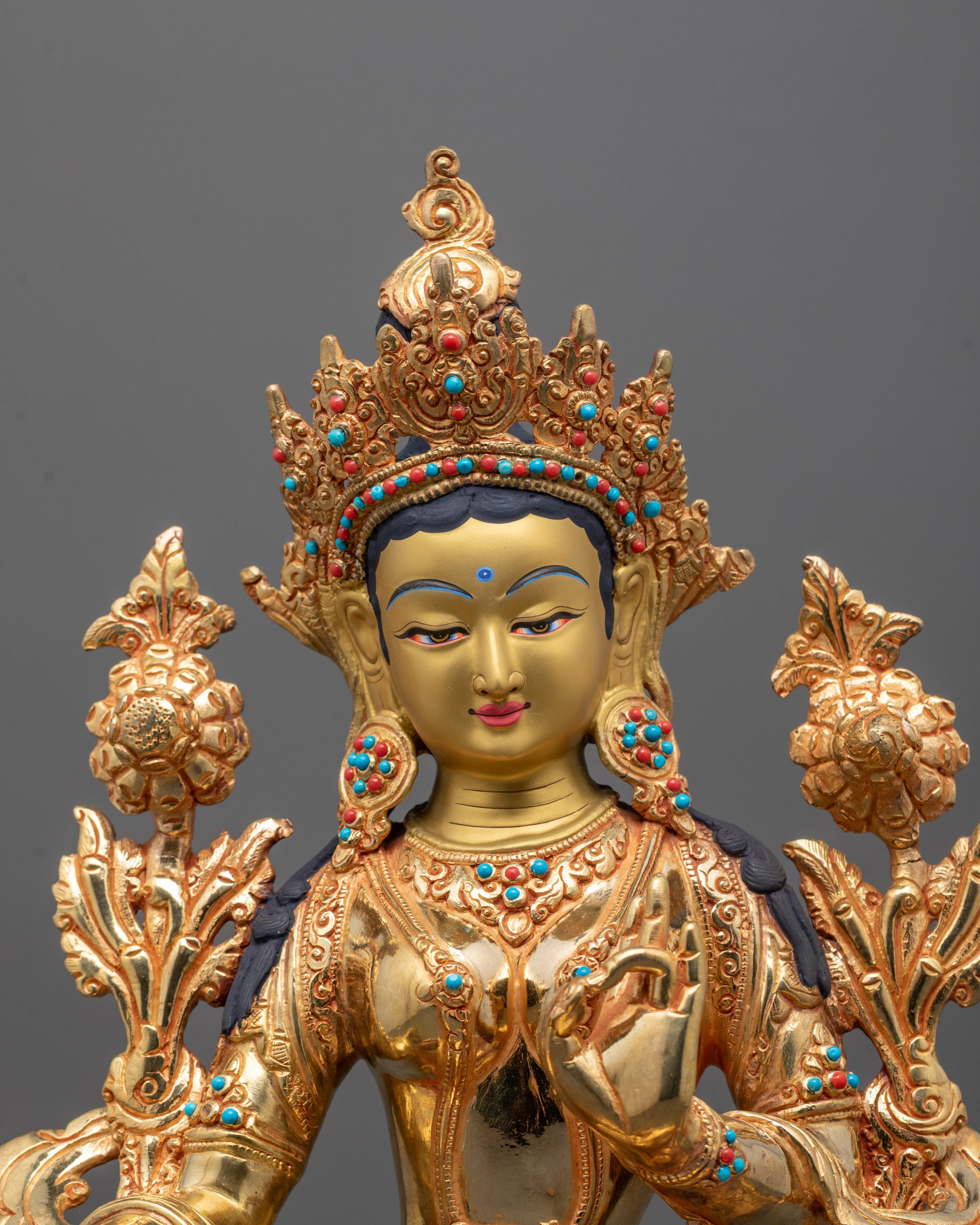 Close-up of Green Tara Statue showing detailed 24k fire gold gilded finish