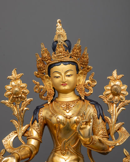 Close-up of Green Tara’s serene face and crown