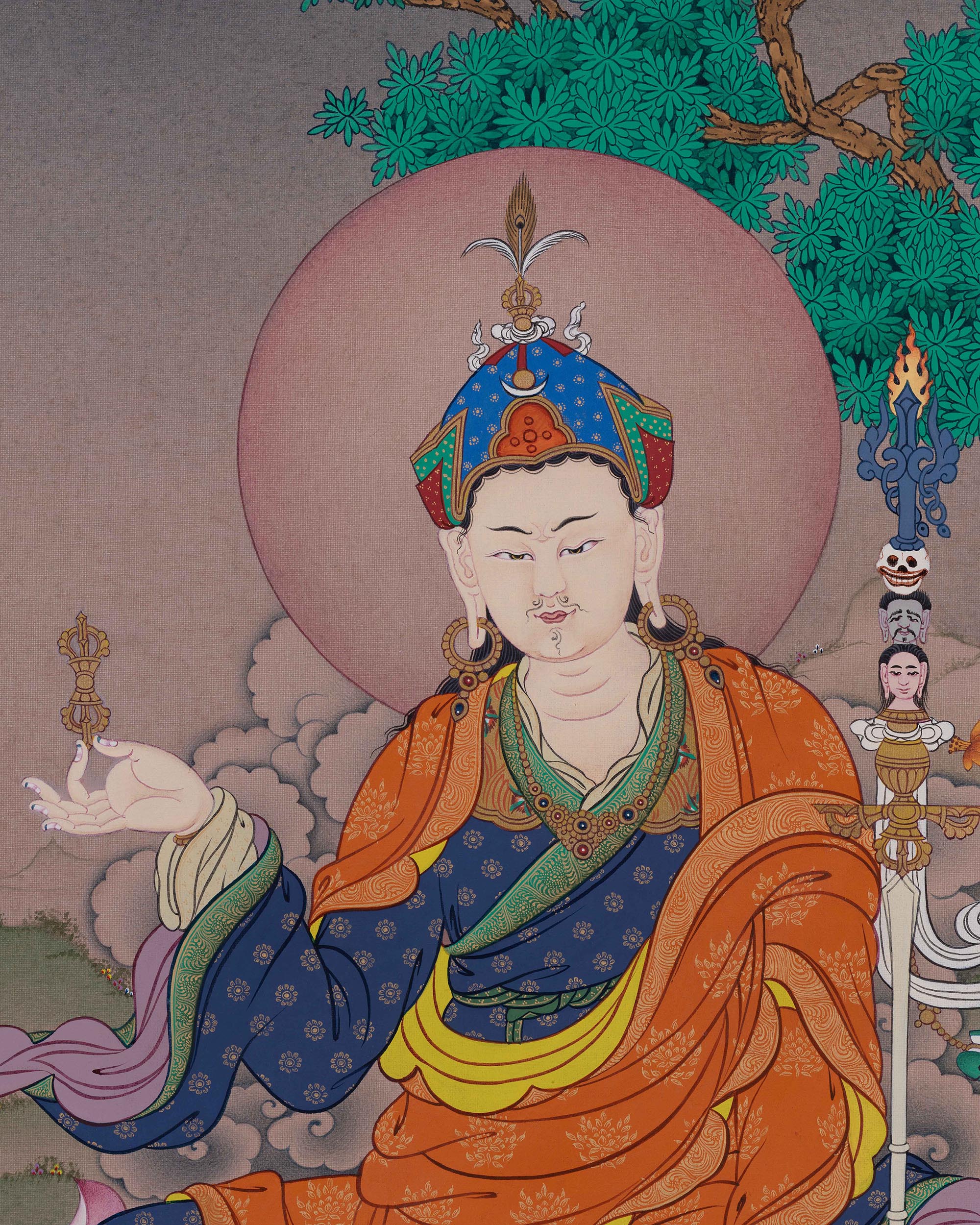 Close-up of Guru Padmasambhava's compassionate, semi-wrathful face adorned with a lotus crown.
