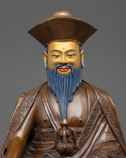 Guru Shapdum’s detailed face and multiple arms holding ritual implements symbolizing protection and transformation.