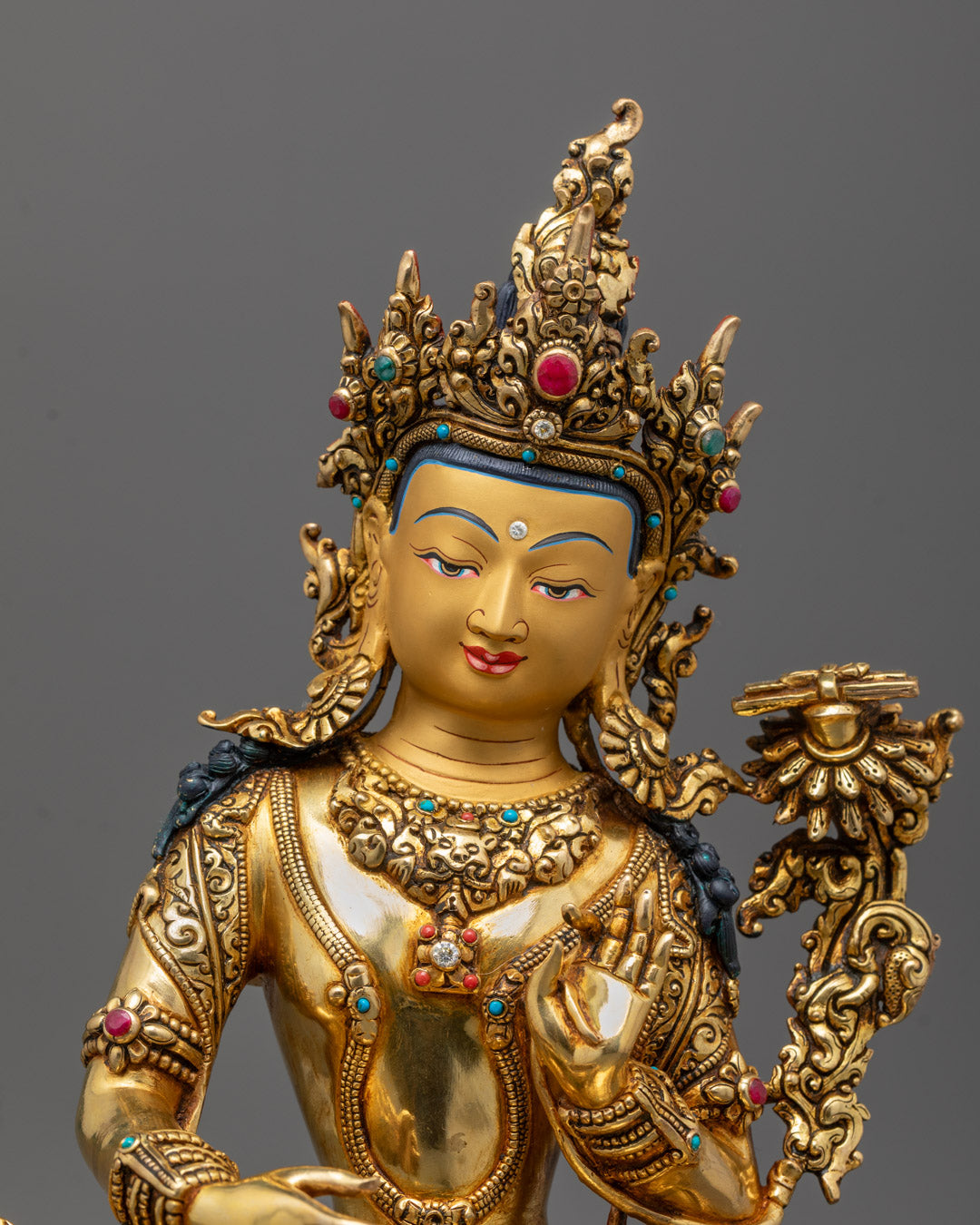 Close-up of Hand-Carved Manjushri Statue with 24k Fire-Gilded Gold Detailing
