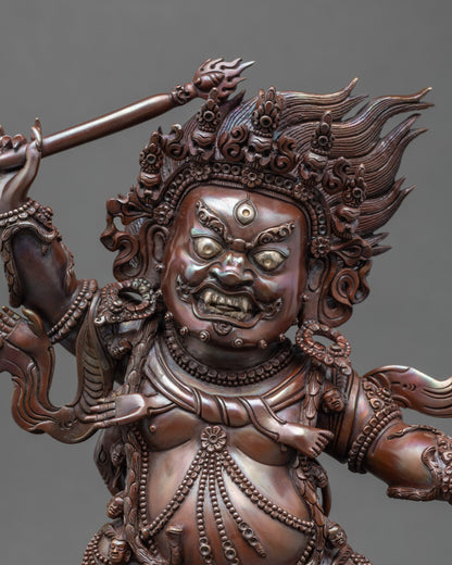 Close-up of Hayagriva Buddhist protector statue with oxidized copper finish