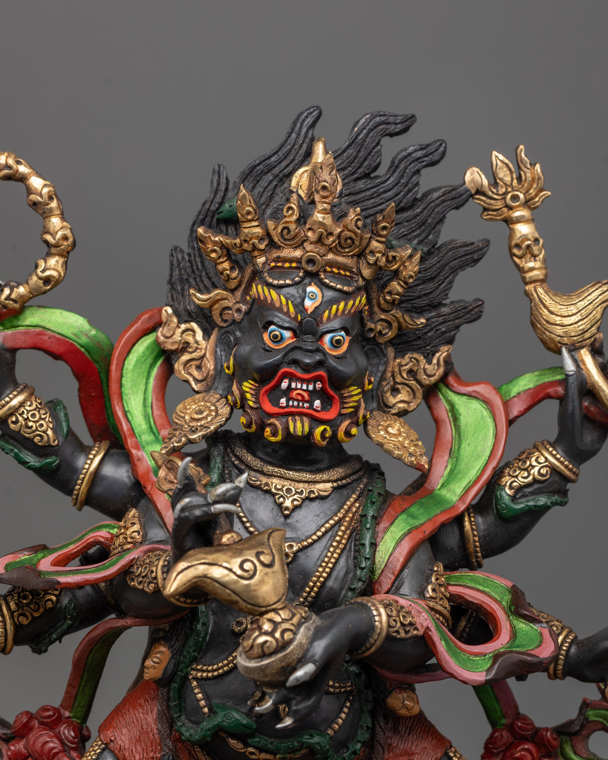 Close-up of Mahakala’s face and three eyes