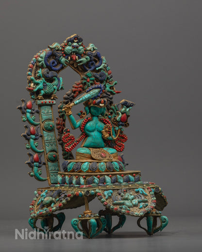 Manjushri Bodhisattva statue showing the flaming sword symbolizing wisdom cutting ignorance.