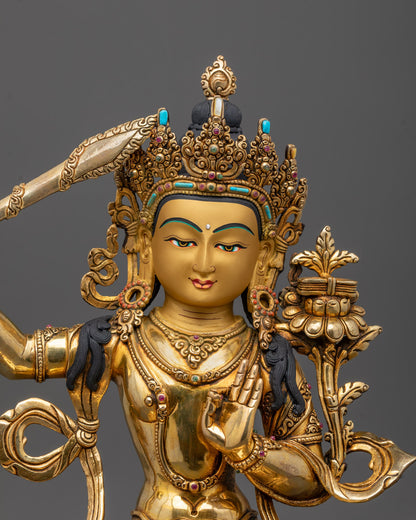 Close-up of Manjushri Sculpture crown, sword, Prajna Paramita, semi-precious stones detail