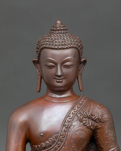 Close-up of Medicine Buddha holding healing nectar bowl, symbolizing physical and spiritual wellness, crafted by Newari artist from Patan, Nepal
