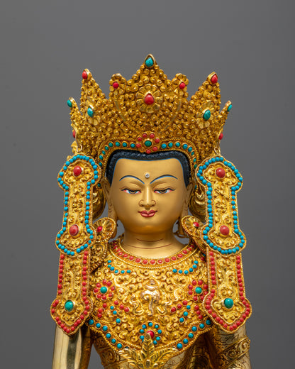 Close-up of Medicine Buddha’s crown, turquoise coral inlay, and serene facial expression