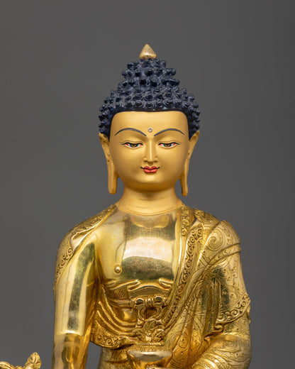 Close-up of Medicine Buddha’s hands holding sacred medicine herb and monk’s bowl