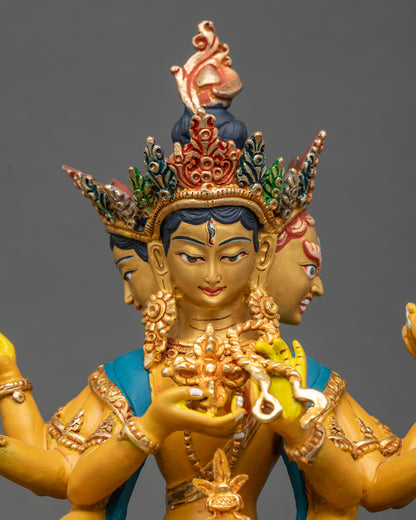 Close-up of Namgyalma Buddha statue showing three 24K gold-painted faces