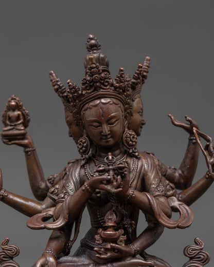 Close-up of Namgyalma Oxidized Statue revealing detailed copper texture and sacred symbols like Vishva Dorje and vase