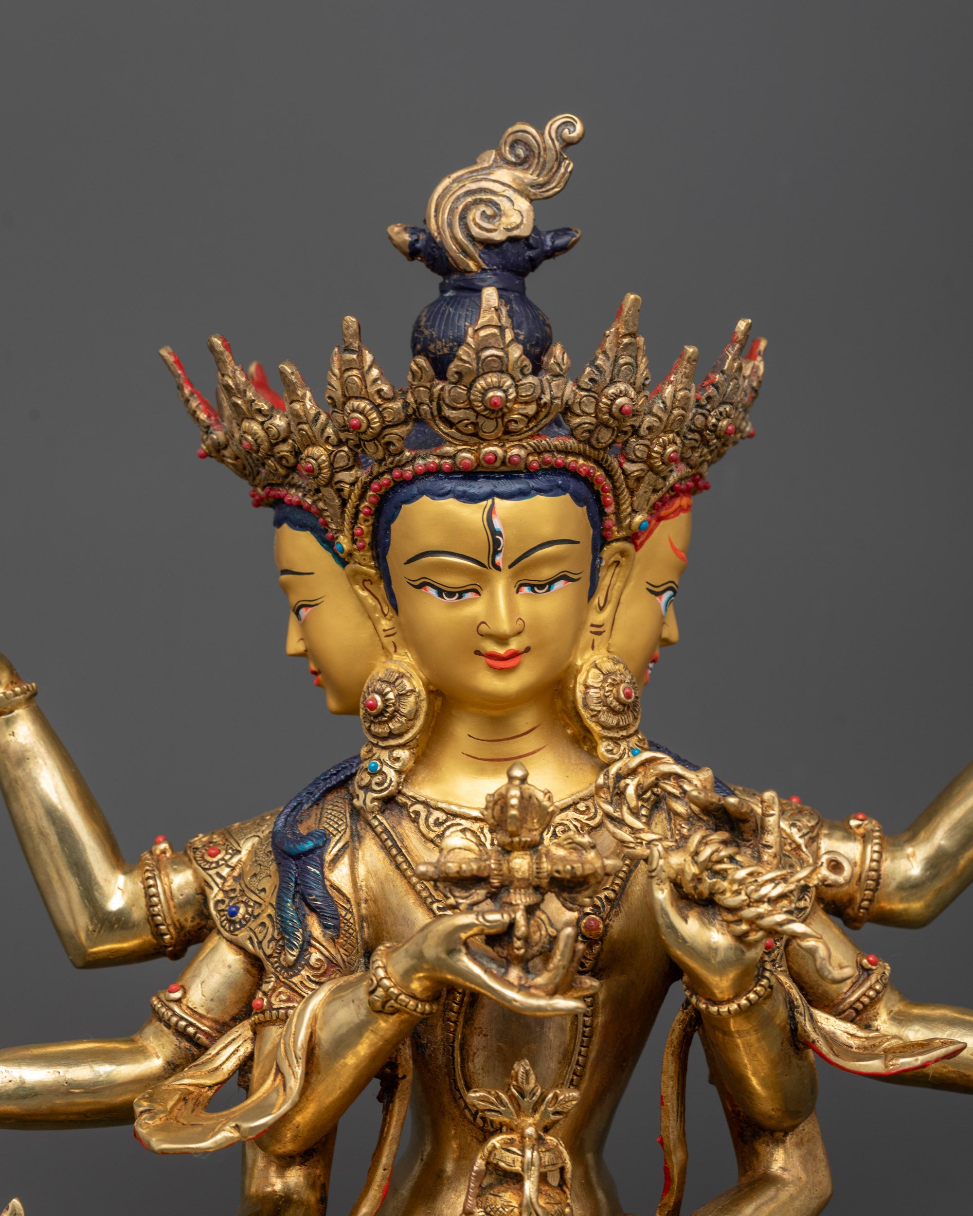 Close-up of Namgyalma’s symbolic objects including vajra, kalash, Amitabha Buddha