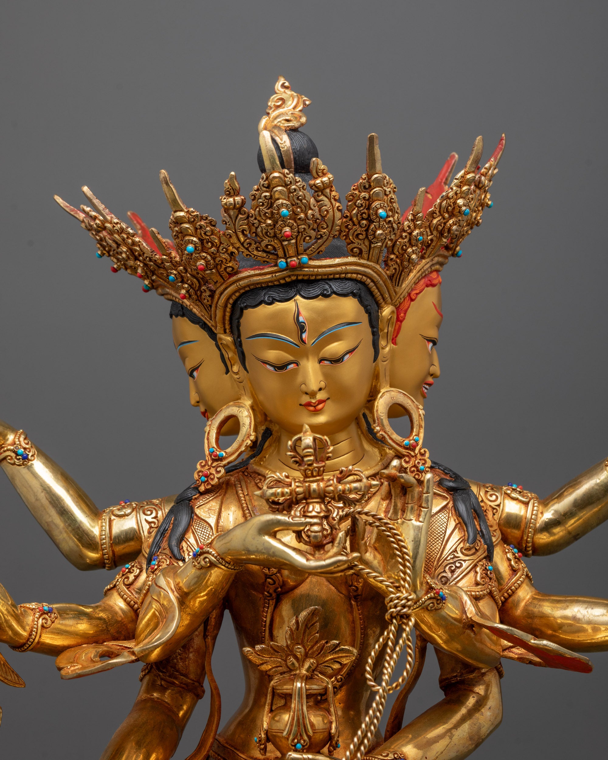 Close-up of Namgyalma’s triple face and semi-precious stone adornments