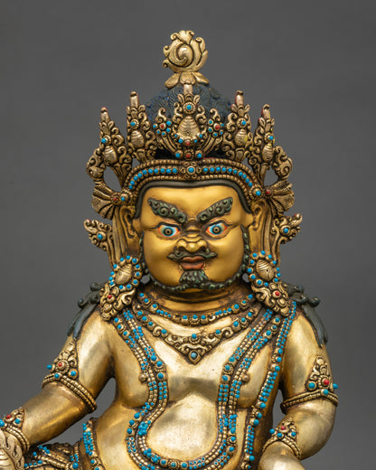 Close-up of Nepalese Black Dzambhala sculpture showing intricate gold and ornaments