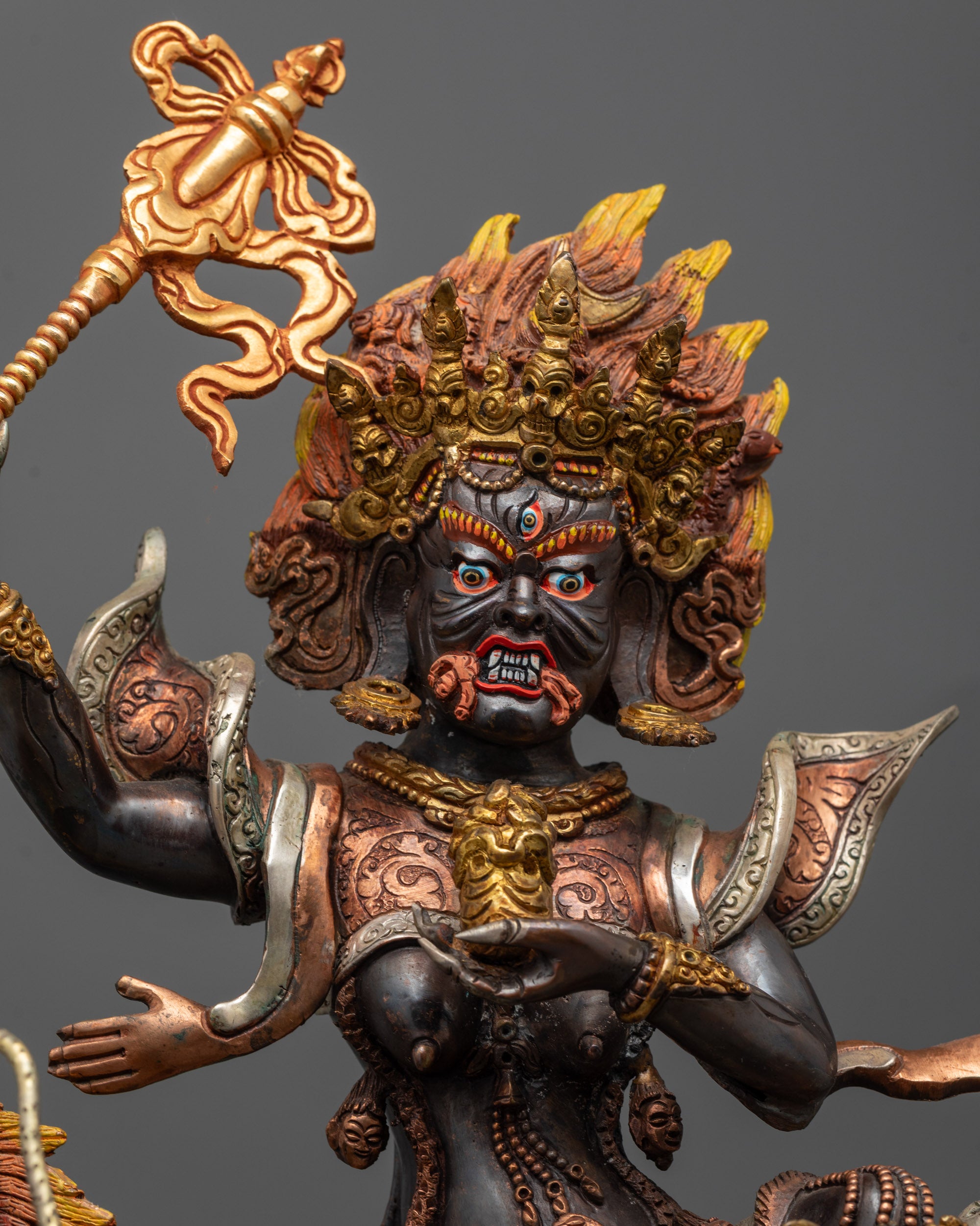 Close-up of Palden Lhamo Sculpture showing gold, silver, copper plating and detailed painting