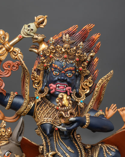 Close-up of Palden Lhamo statue, detailed meditation deity figure with gold accents