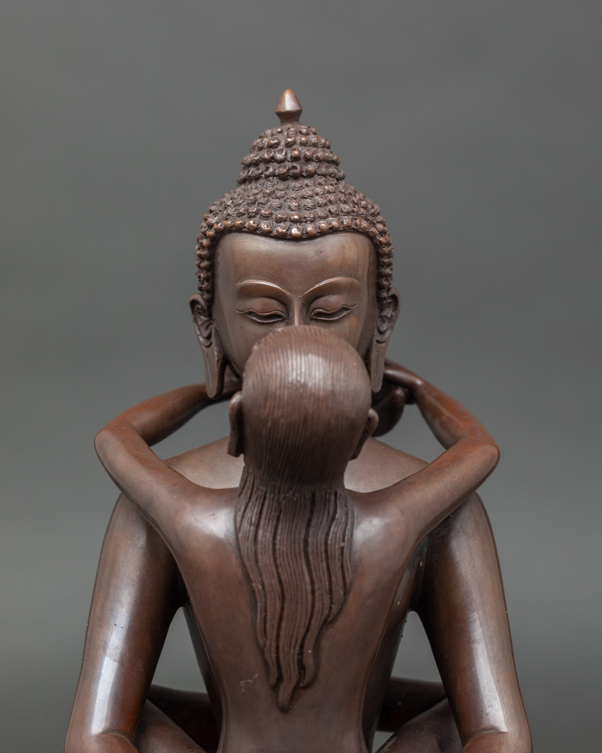 Close-up of Samanthabhadra Bodhisattva face showing intricate copper details