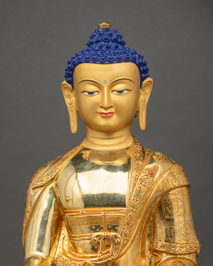 Close-up of Shakyamuni Buddha Statue showing intricate 3D copper carvings and fire-gilded details