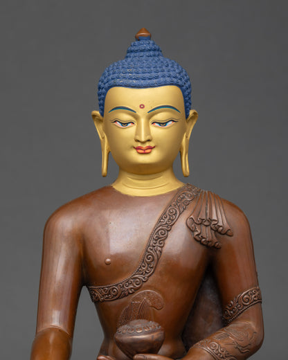 Close-up of Shakyamuni Buddha face showing radiant 24K gold paint and serene expression