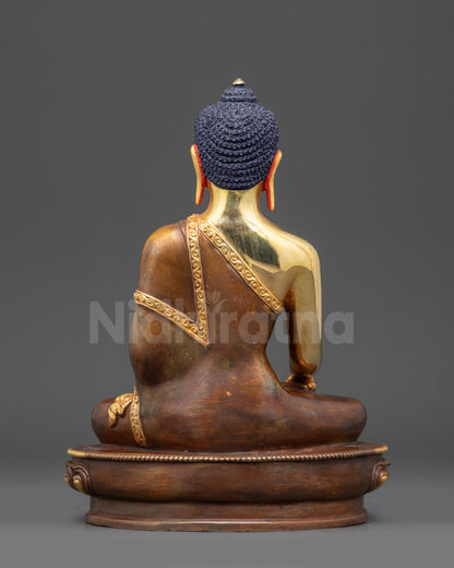 Close-up of Shakyamuni Buddha gold-painted face with vibrant Acrylic Colors detailing