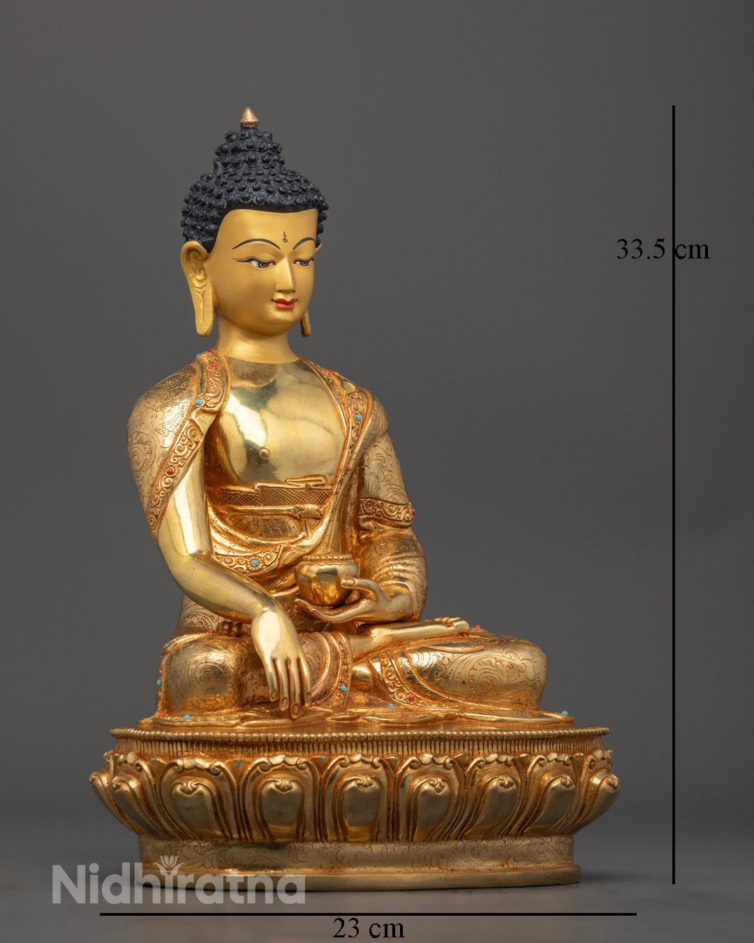 Close-up of Shakyamuni Buddha's serene face gilded with 24k gold, showcasing traditional Nepalese craftsmanship and symbolic spiritual expression.