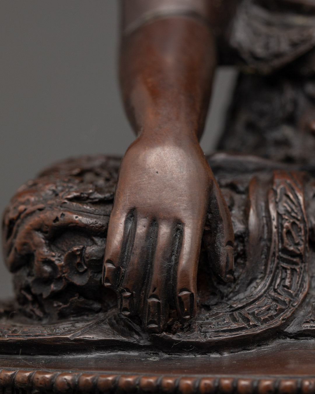 Shakyamuni Buddha’s serene face with intricate acrylic color detailing, handcrafted in Nepal.