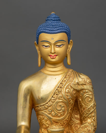 Close-up of Shakyamuni Buddha statue showing gold fire gilding and copper alloy craftsmanship