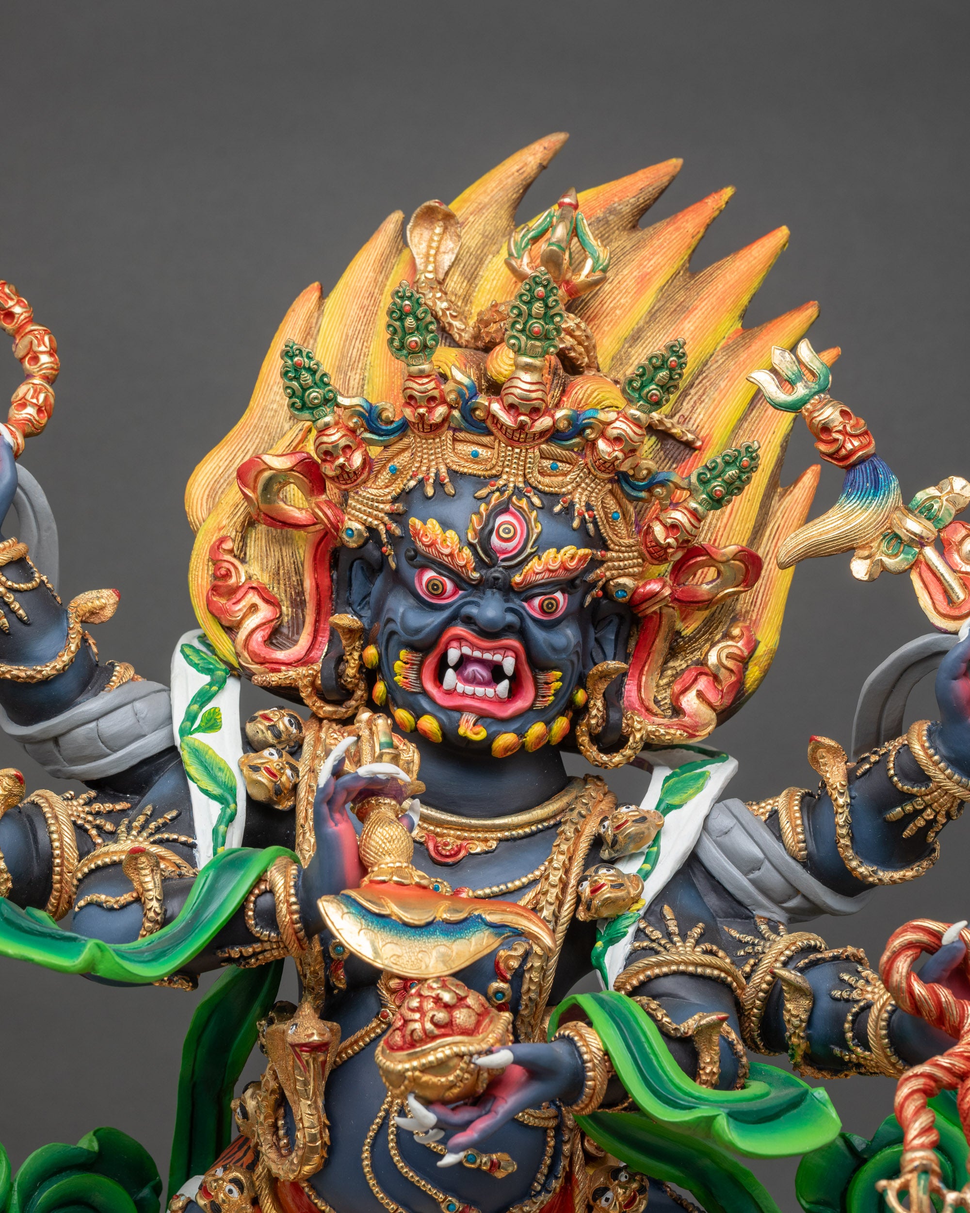 Close-up of Six-Armed Mahakala Statue showing detailed craftsmanship and vibrant acrylic colors