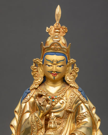 Close-up of Tsokye Dorje Buddha statue showing intricate fire-gilded copper details
