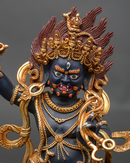 Close-up of Vajrapani Bodhisattva statue with semi-wrathful expression