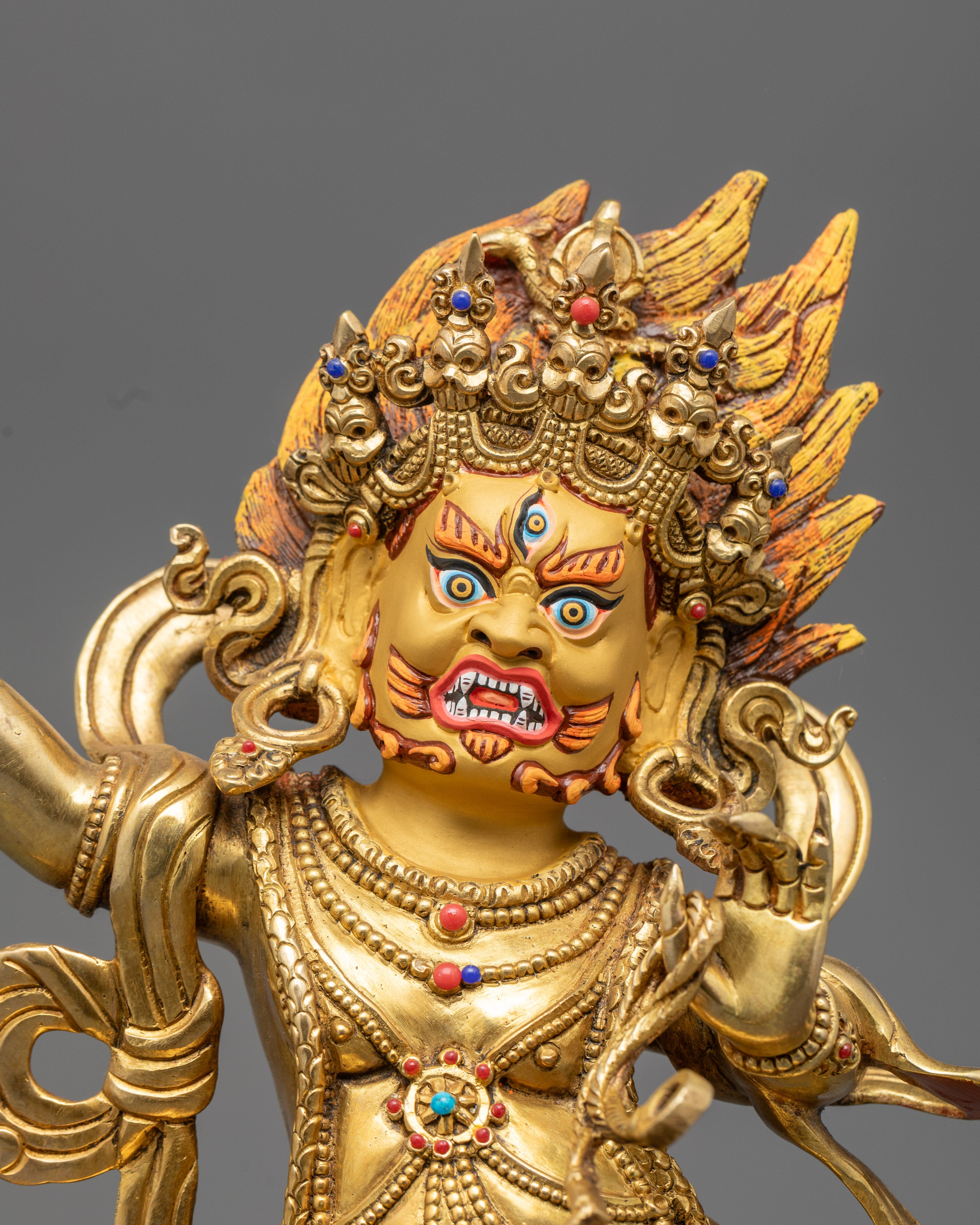 Vajrapani Statue’s detailed face with third eye and vivid acrylic colors