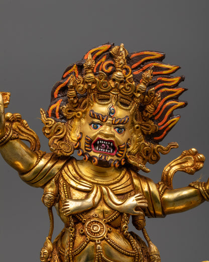 Close-up of Vajrapani's 24k gold polished face showing fierce expression 