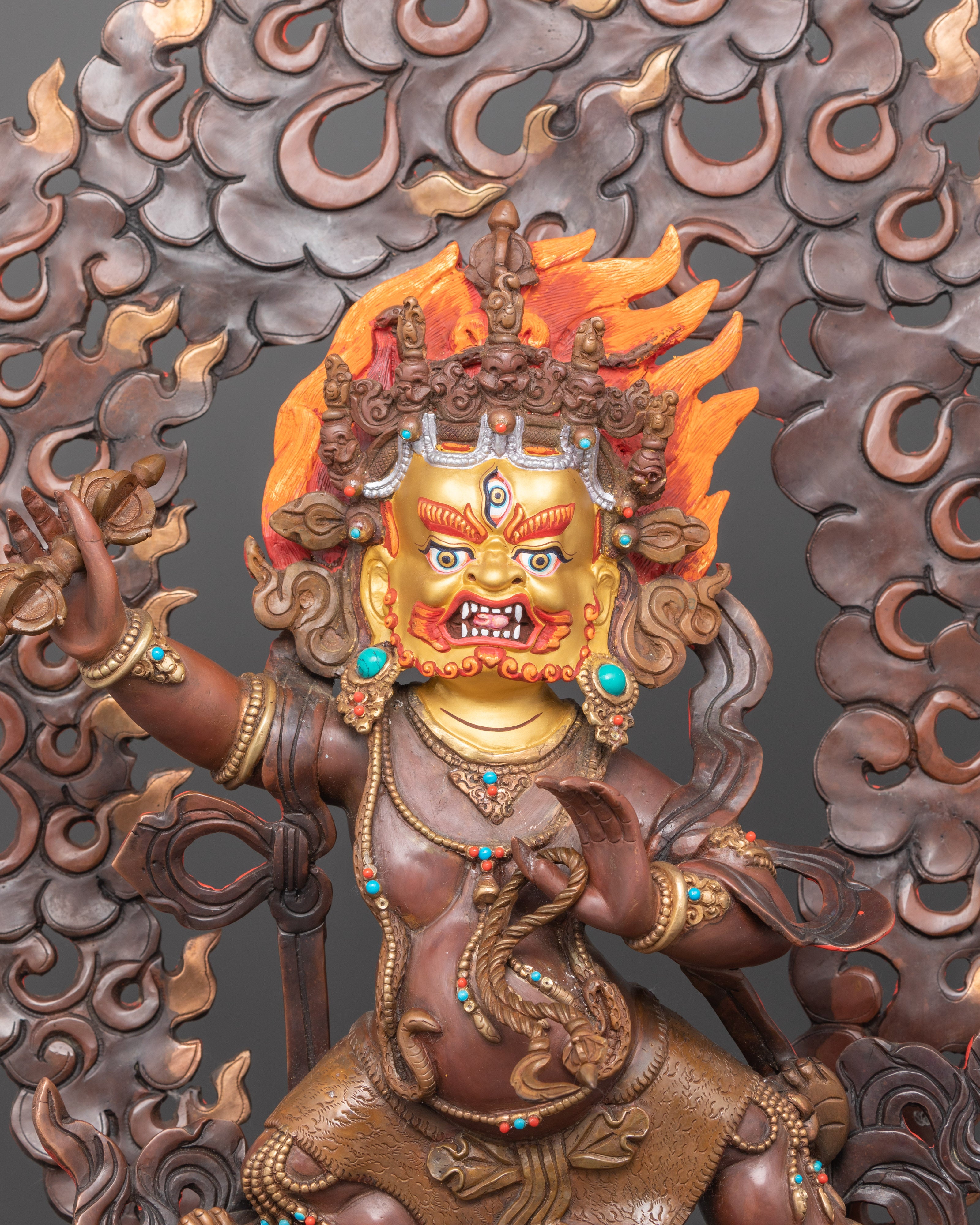 Close-up of Vajrapani’s face, vajra, lasso, and semi-precious stone adornments