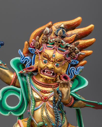 Close-up of Vajrapani's fierce facial expression and vajra weapon symbolizing power