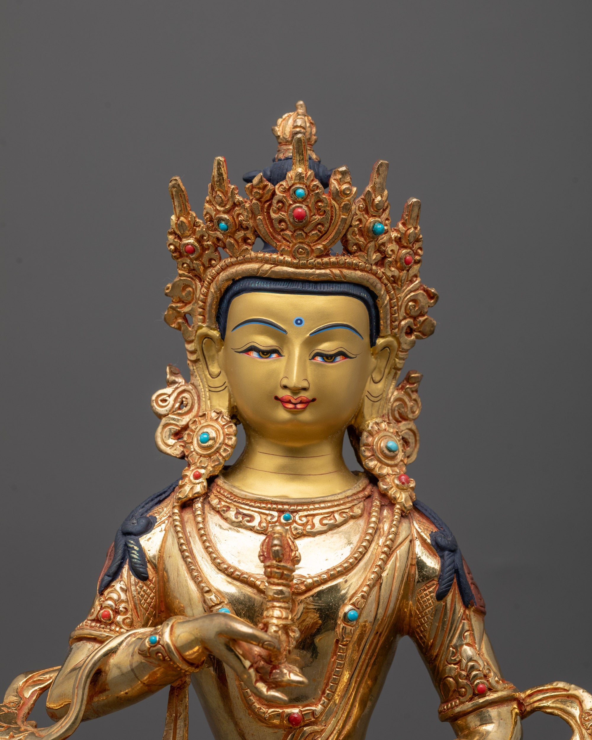 Close-up of Vajrasattva Statue showing intricate 24k fire gold gilded detailing