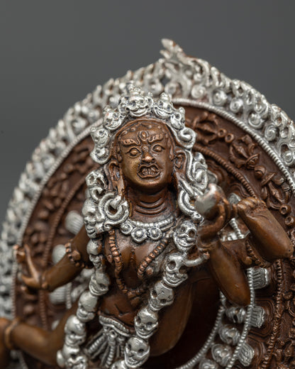 Close-up of Vajrayogini deity statue showing dynamic dancing posture and sacred implements