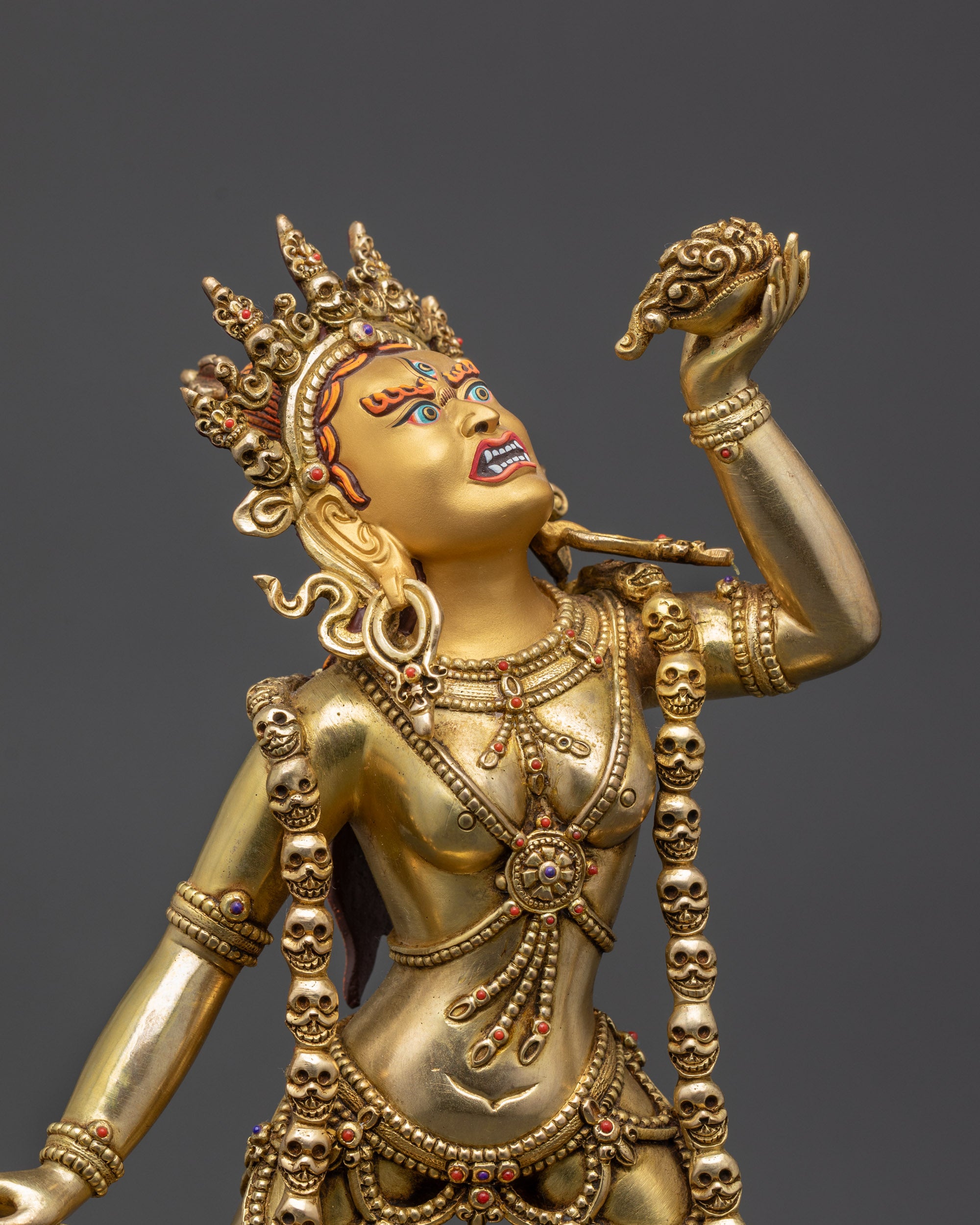 Close-up of Vajrayogini face showing third eye and five-skull crown handcrafted Nepal