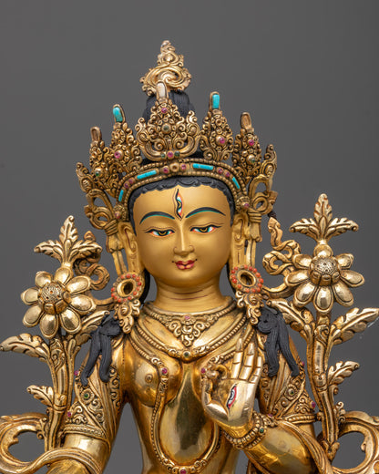 Close-up of White Tara Sculpture’s 24K fire-gilded body and semi-precious stone details