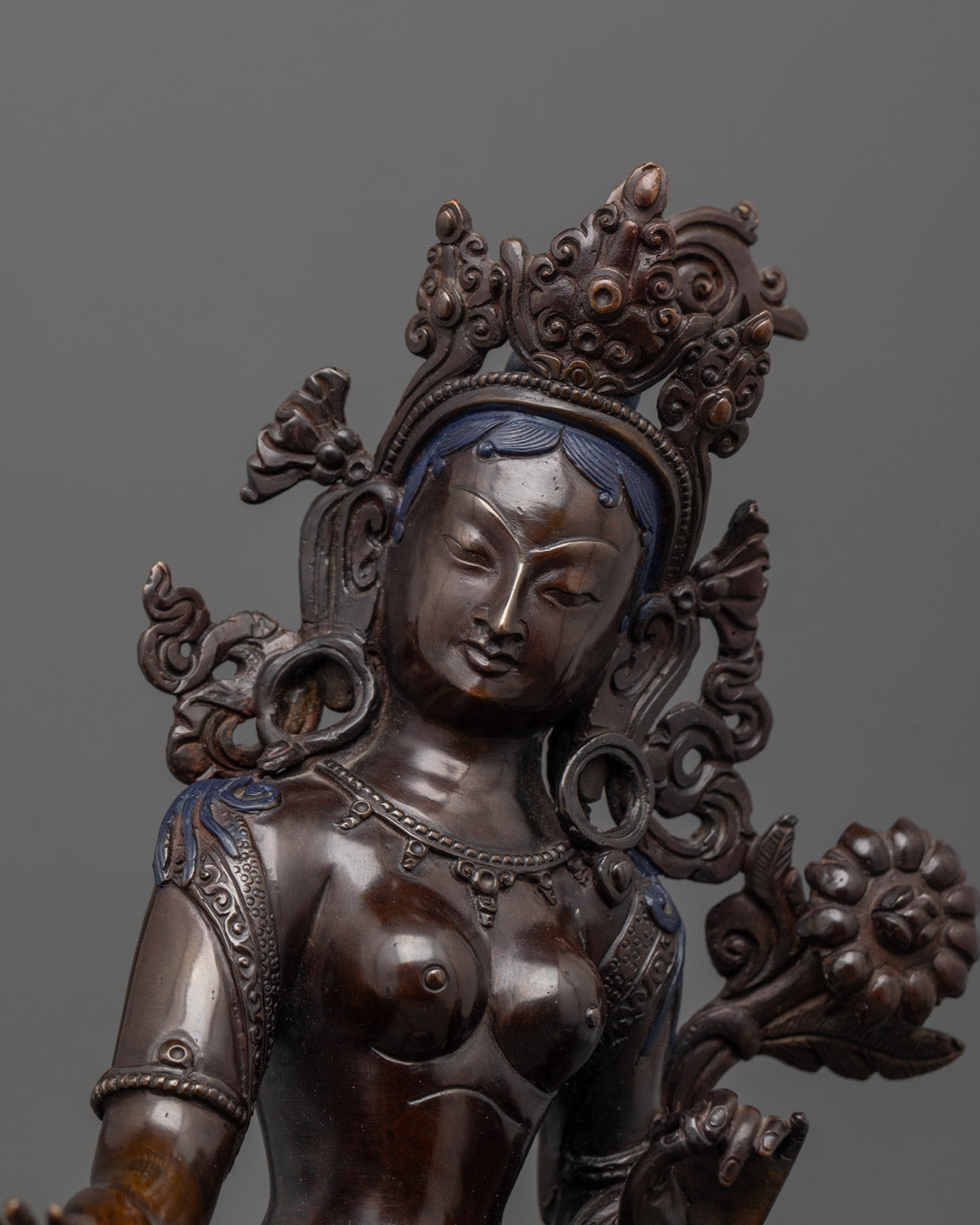 Close-up of White Tara face with serene expression and detailed Nepali craftsmanship