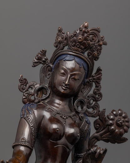 Close-up of White Tara face with serene expression and detailed Nepali craftsmanship