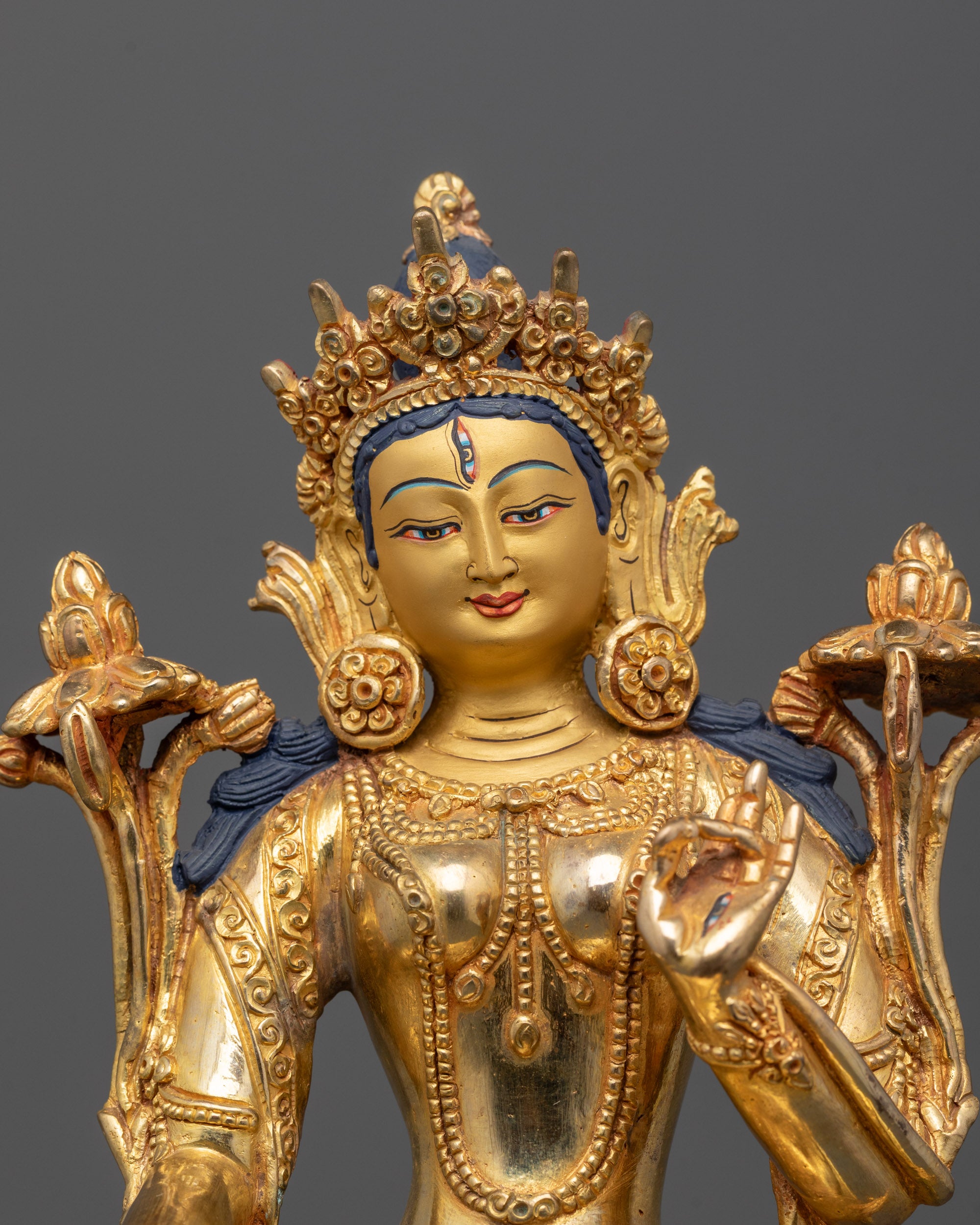 Close-up of White Tara’s Serene 24k Gold Polished Face and Detailed Crown