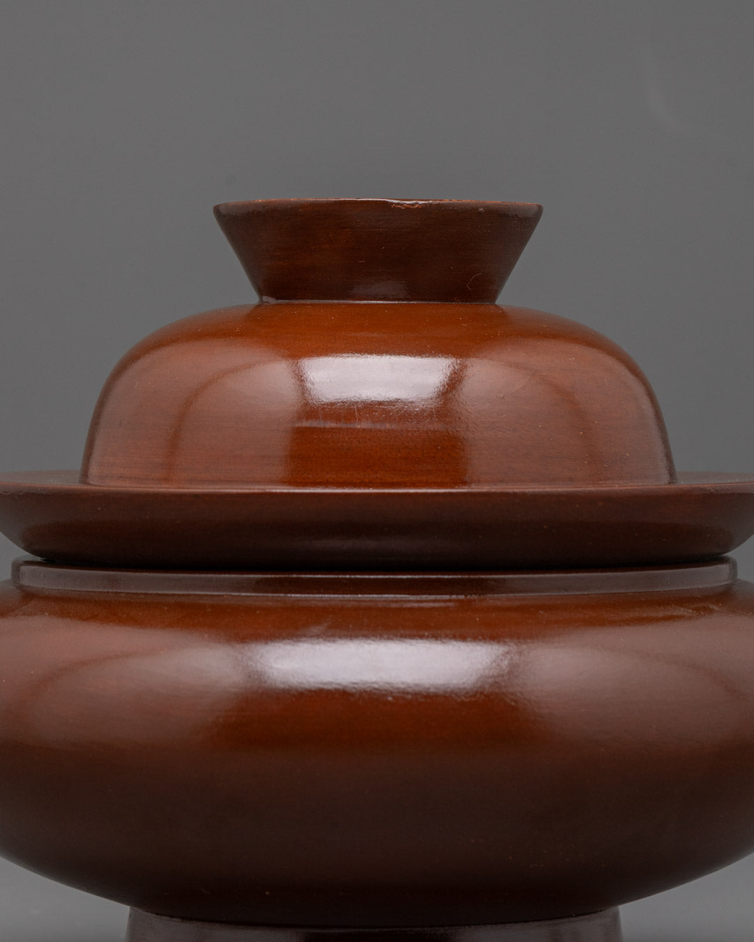 Close-up of carved wood texture on Tibetan Paru Bowl