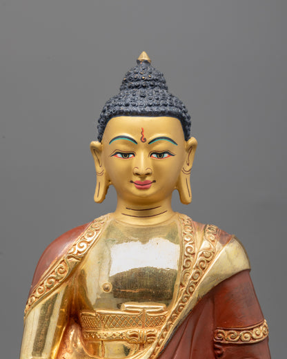 Close-up of gold-gilded face and intricate craftsmanship on Amitabha Buddha Statue