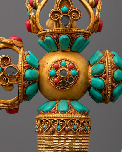 Close-up of gold-plated filigree and turquoise coral on Tibetan Kartika ritual axe