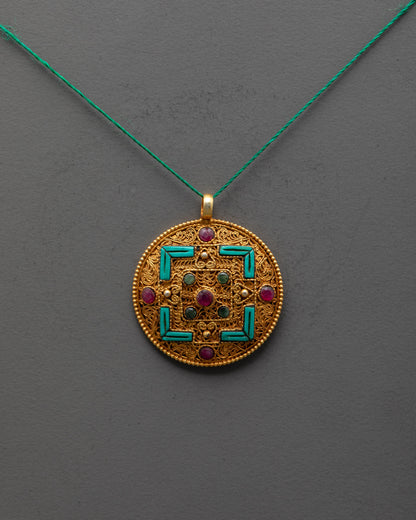 Close-up of intricate Mandala Pendant showing gemstone details and artisan metalwork