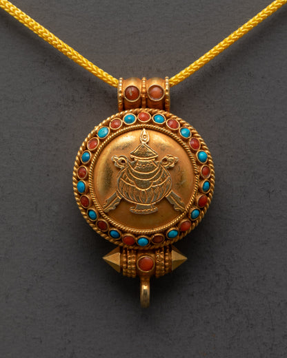 Close-up of intricate carvings on the gold-gilded Tibetan Treasure Vase Locket pendant