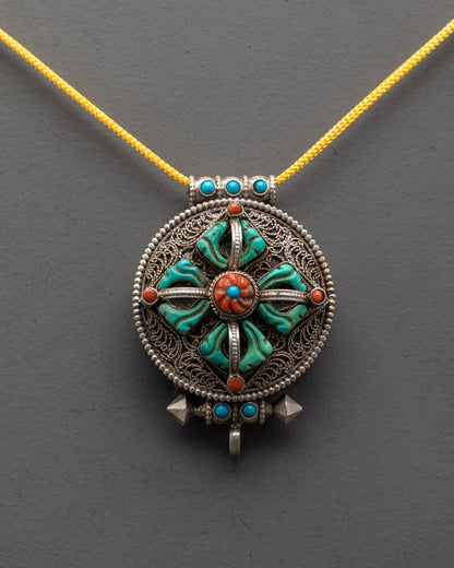 Close-up of intricate filigree design on Bishwo Vajra Locket adorned with lapis lazuli